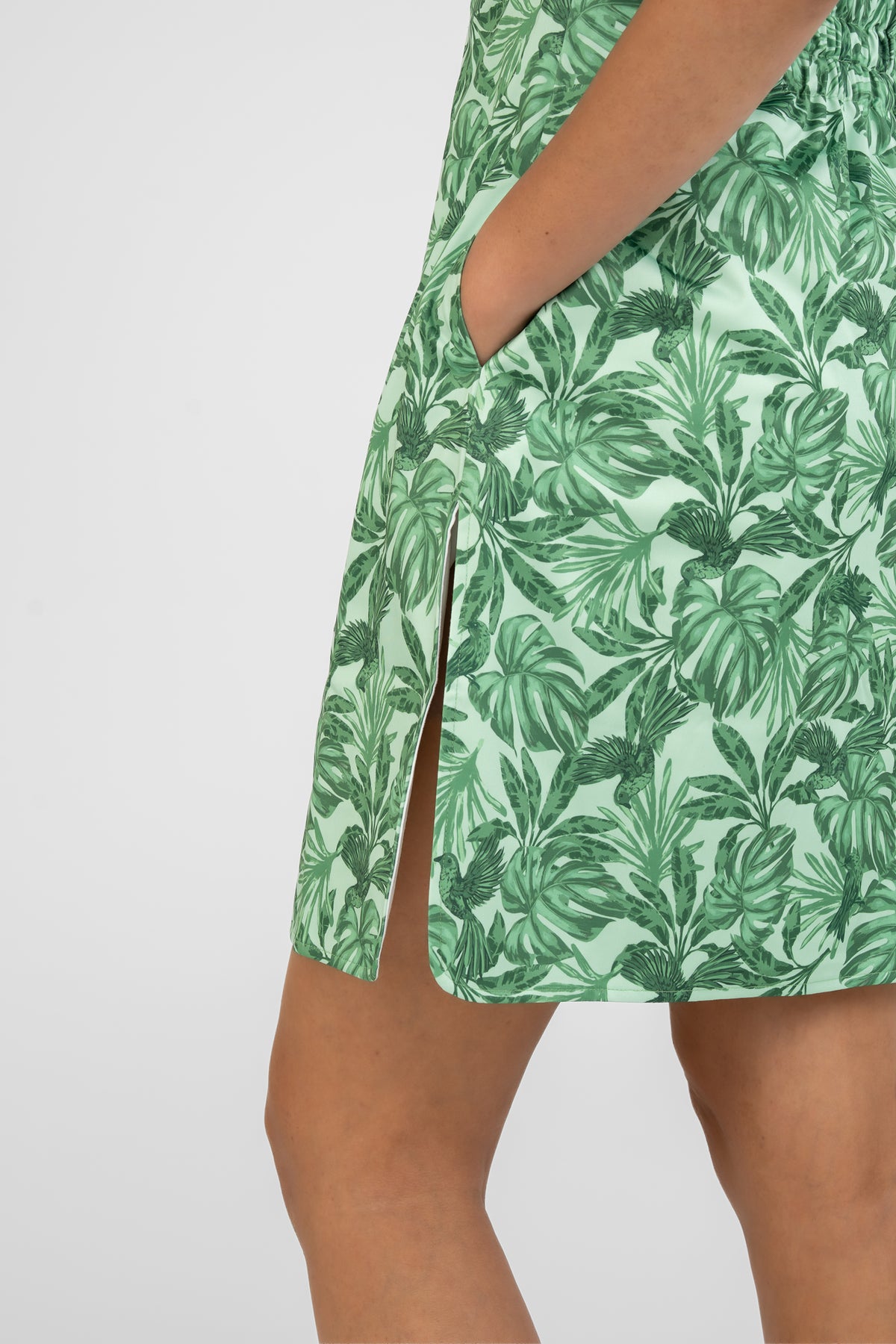 Side view of the Neren Signature After-Swim Dress in Canopy on a model