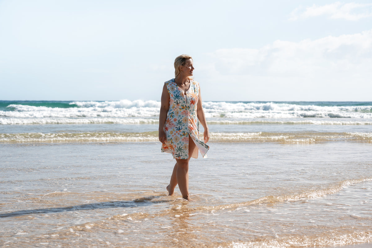 Neren Signature After-Swim Dress in Valencia worn over swimwear at the shoreline